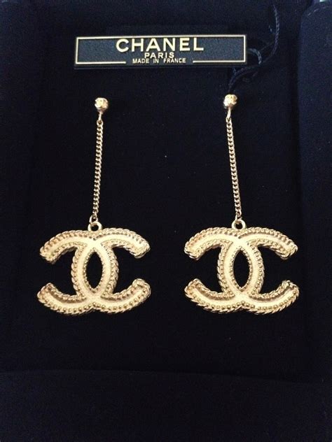 big chanel earrings on ear|chanel crochet earrings.